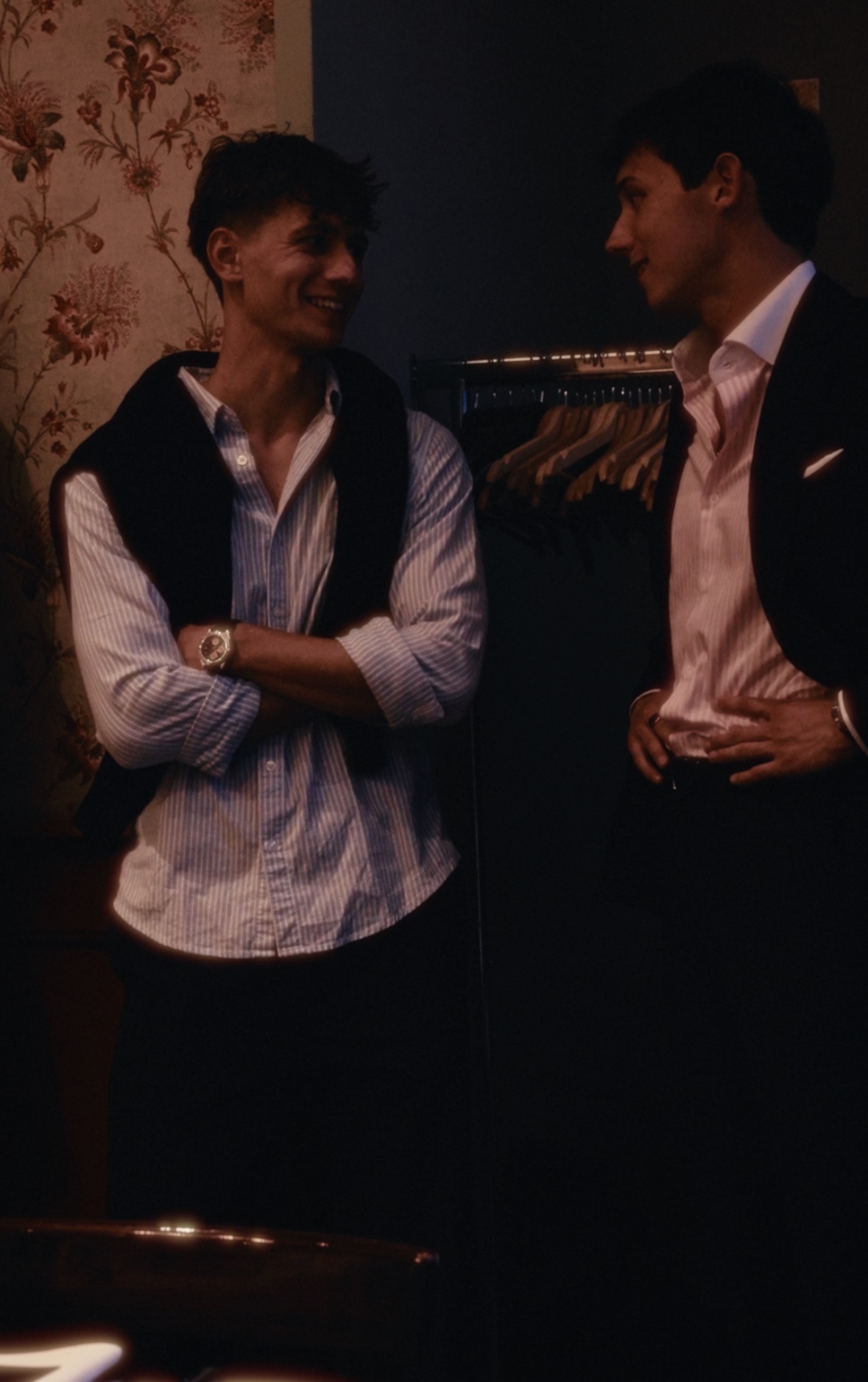 Two members talking at a private gathering